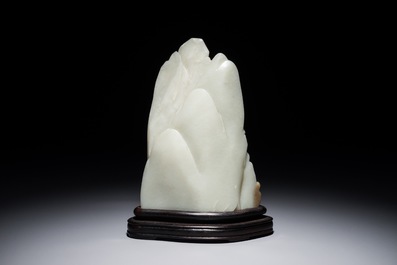A Chinese jade carving of a mountain landscape, 20th C.